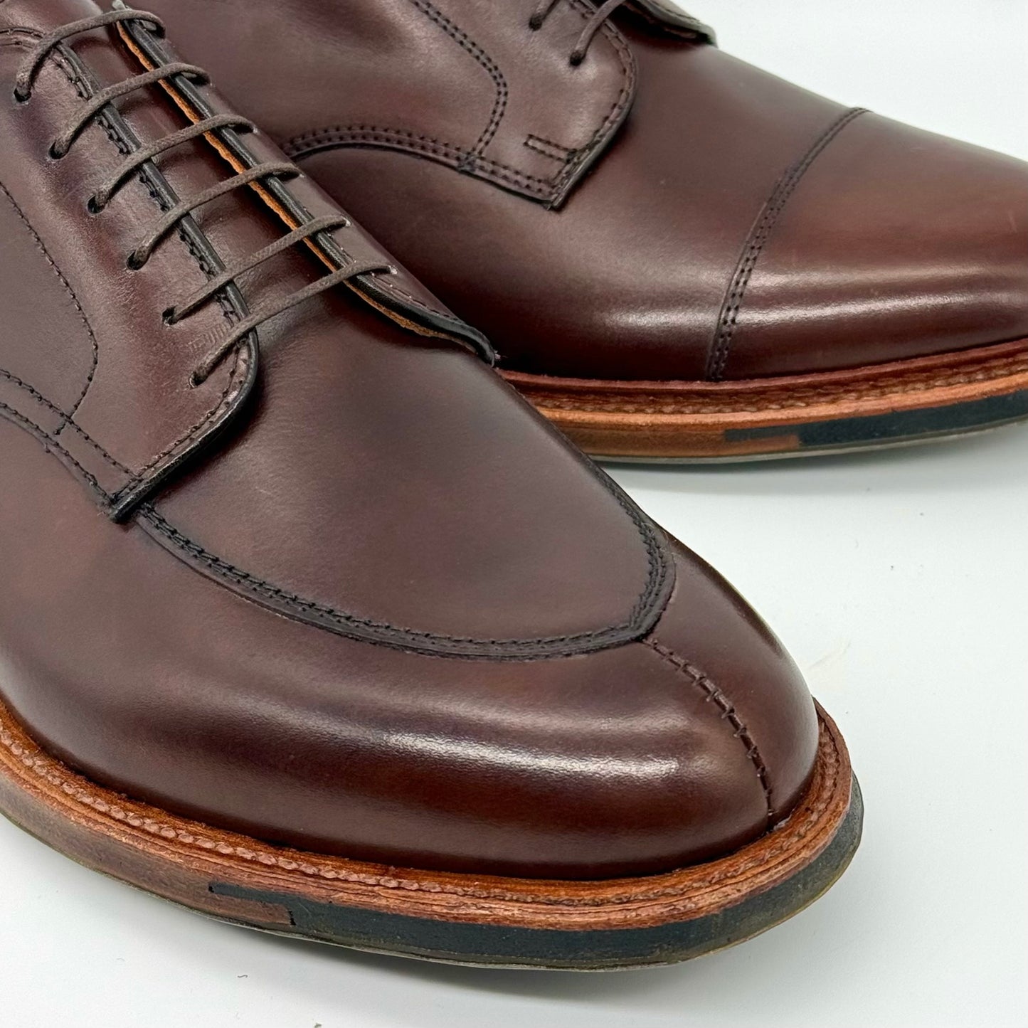 Close-up of the ALDEN SHOES D6629C - Brown Calf V Tip Blucher with laces, detailed stitching, and a sturdy Commando Sole, set against a white background.