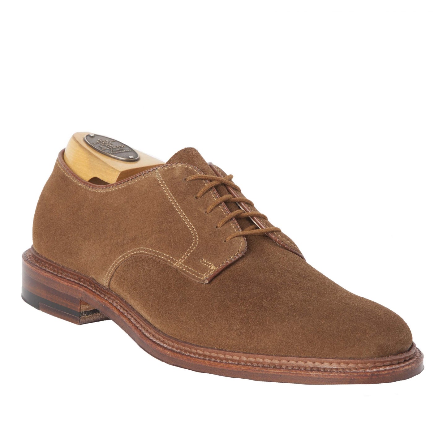The Alden Madison 29336F - Unlined Plain Toe Dover Snuff Suede dress shoe features a rounded Barrie Last toe, tan stitching, a stacked wooden heel, flex leather sole, and includes a shoe tree. Displayed on a white background.