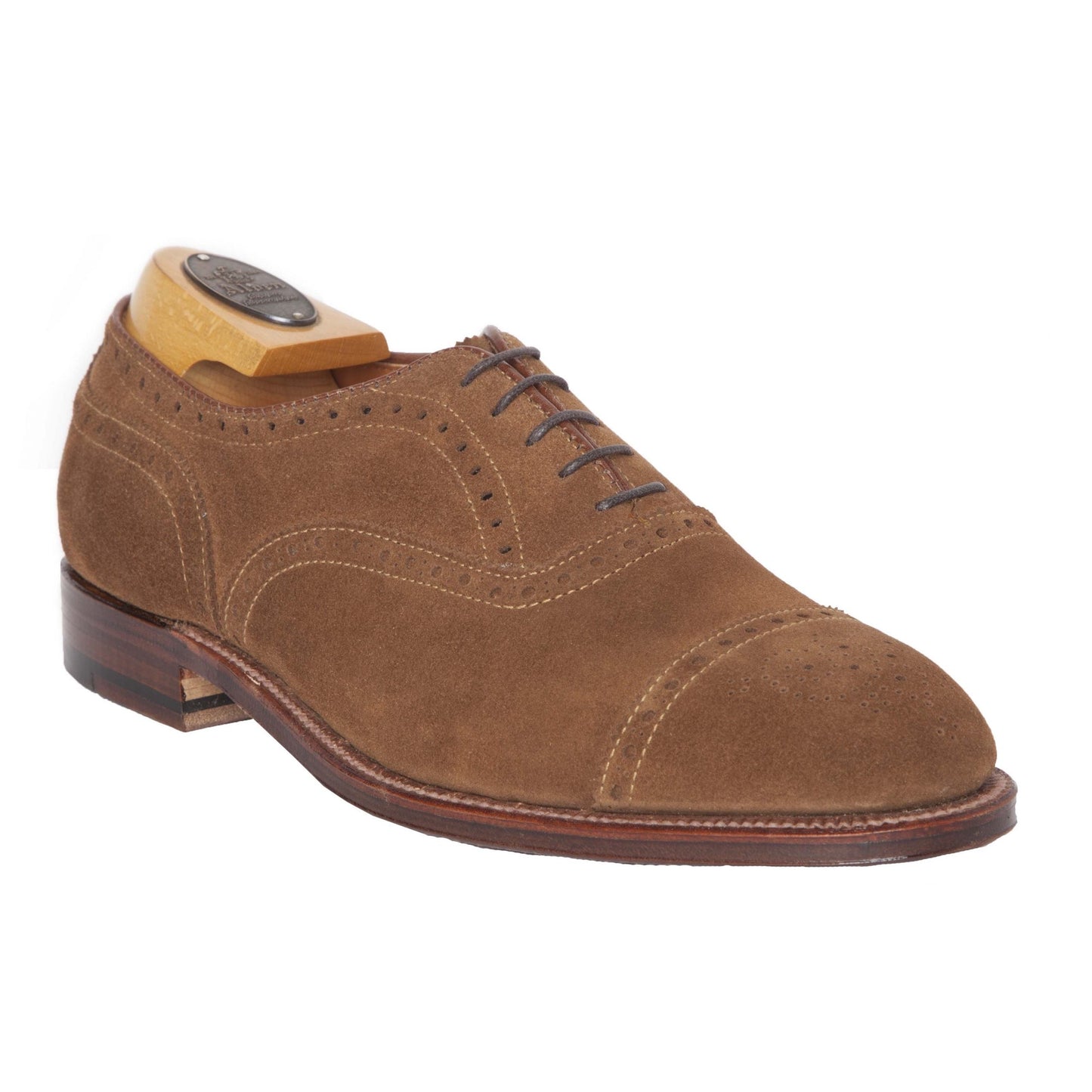The Alden Madison 51670F Medallion Cap Toe Bal in snuff suede features decorative broguing, a Flex Leather Sole, stacked heel, and classic Hampton Last. Shown with wooden shoe tree inserted.