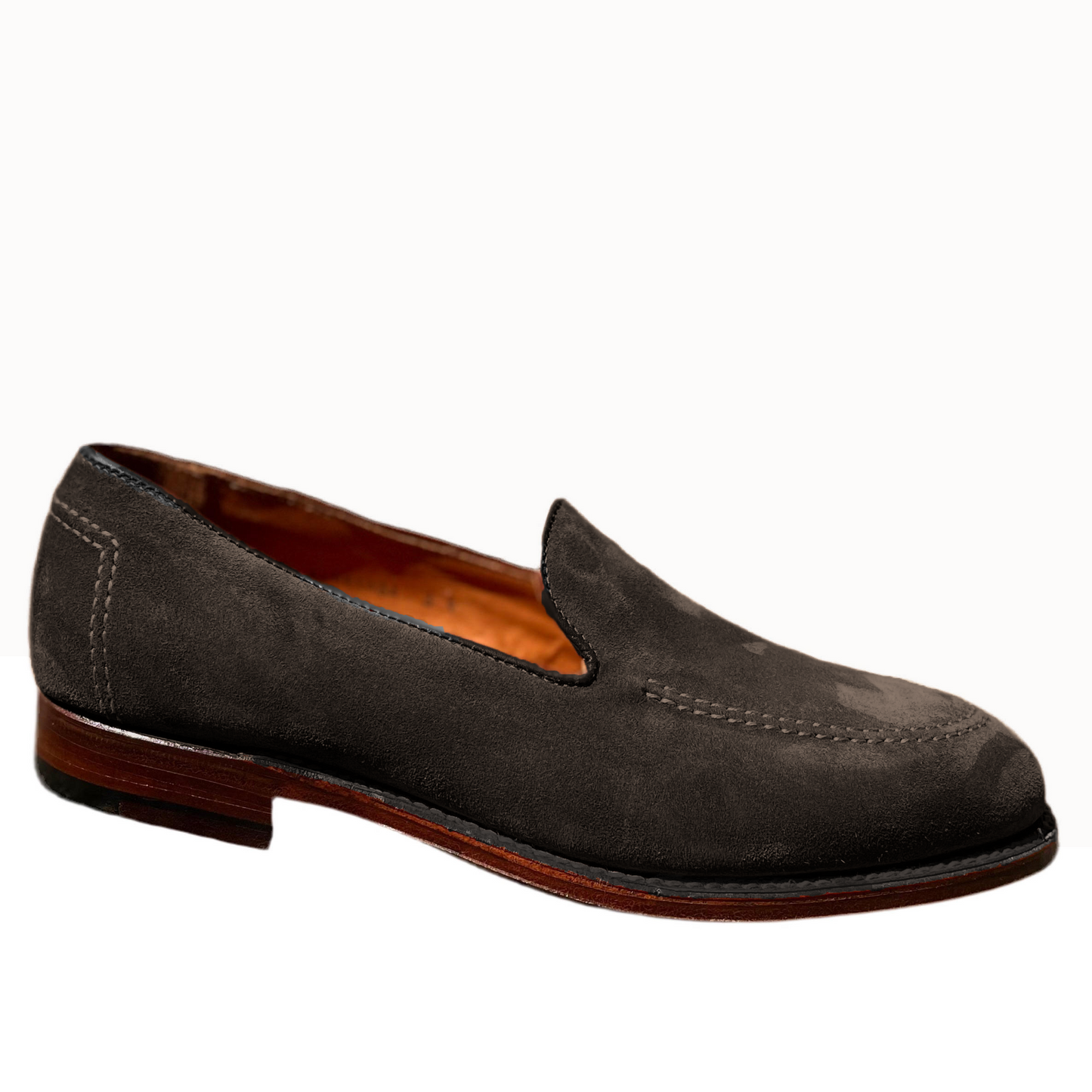 A single ALDEN SHOES D5105 - Vanderbilt in Dark Brown Suede, featuring visible stitching, a low wooden heel, and a slightly pointed toe on the Aberdeen Last, is photographed against a white background.
