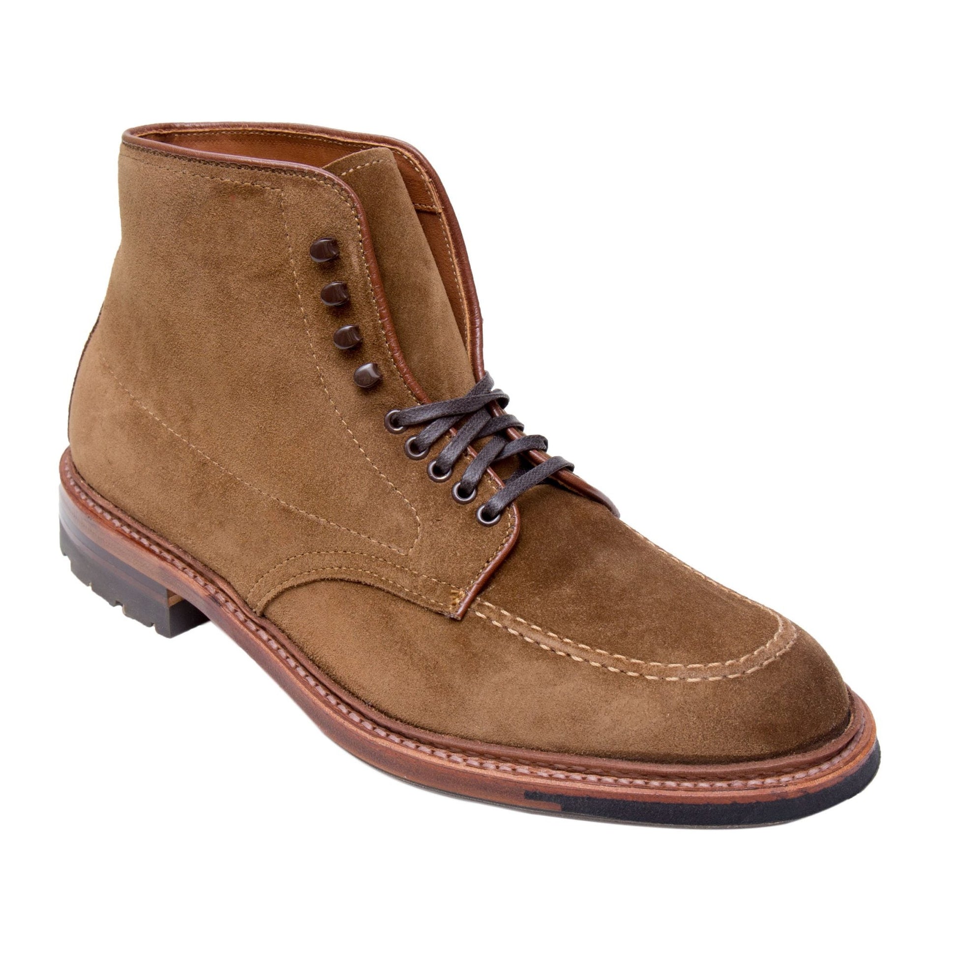 The Alden Madison 4011HC - Indy Boot in Snuff Suede features dark laces, metal eyelets, and storm welt construction. Crafted on a Truebalance last with detailed stitching, it boasts a sturdy sole with a slight heel and classic design.