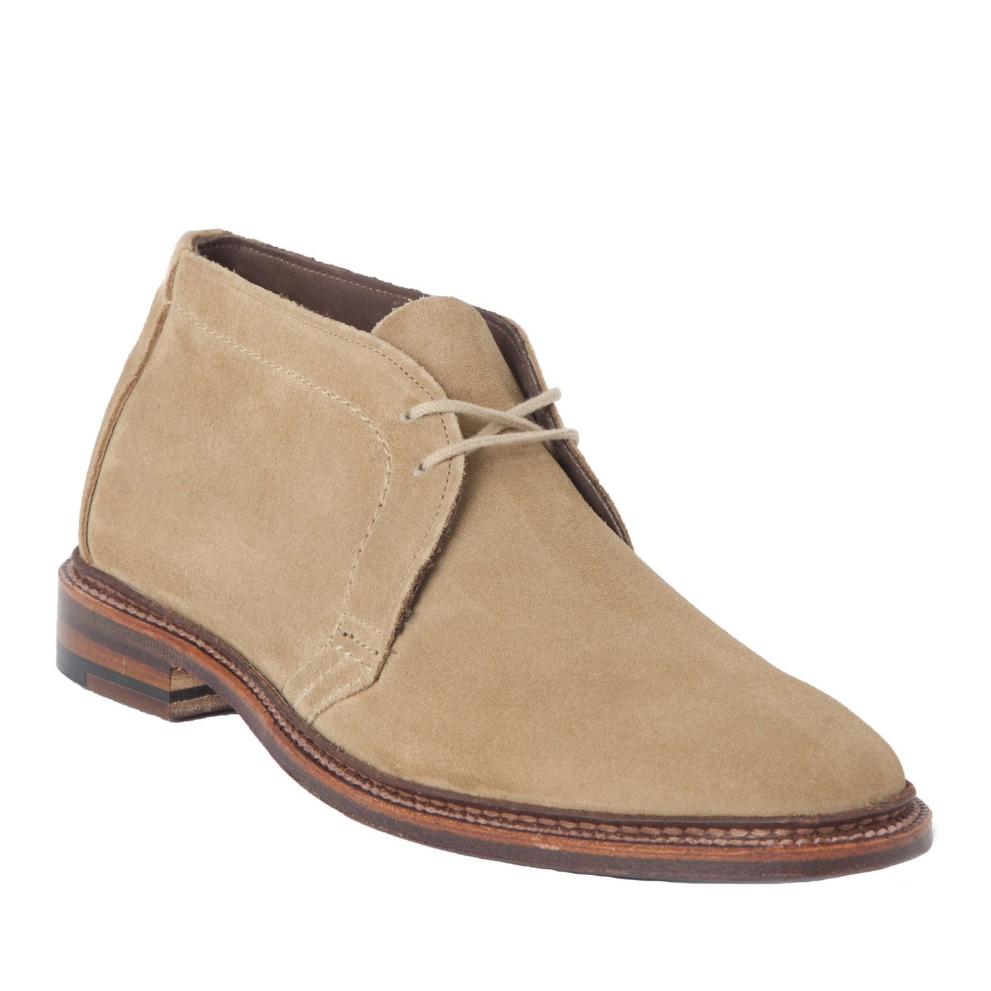 The Alden Madison 1494 - Unlined Chukka in Tan Suede features a tan suede upper, brown leather soles on the Leydon last, light-colored laces, visible stitching, and a slightly elevated heel.