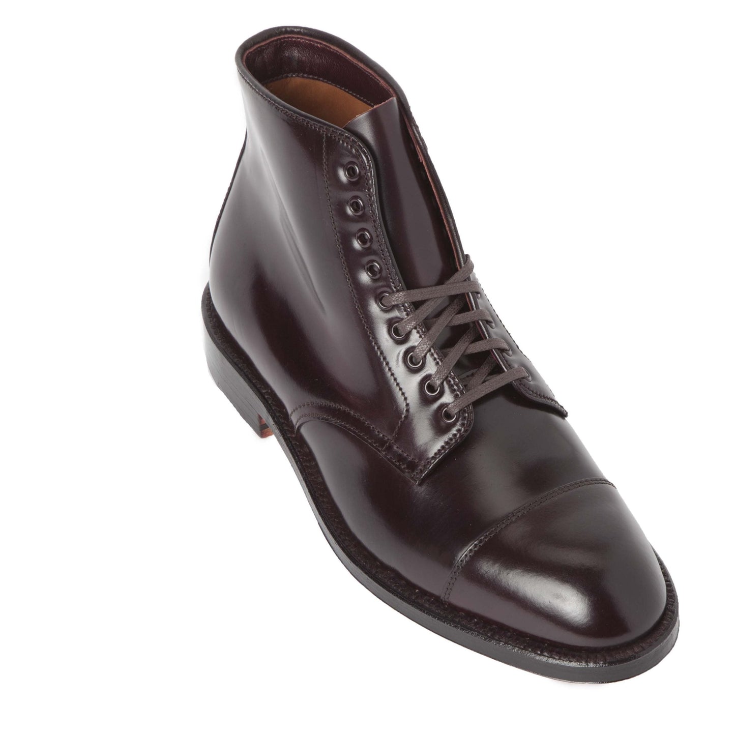 The Alden Madison 4060 Cap Toe Boot in Color 8 Shell Cordovan is a polished burgundy leather dress boot crafted on the Grant Last, featuring laces, eyelets, a cap toe design, and a sleek finish with a premium shell cordovan leather sole, elegantly set against a plain white background.