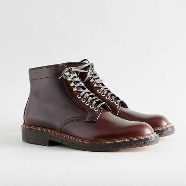 The Alden Madison D1848H - Plain Toe Boot in Brown Chromexcel features lace-up styling, silver eyelets, and crepe rubber soles, shown side by side on a plain light background.