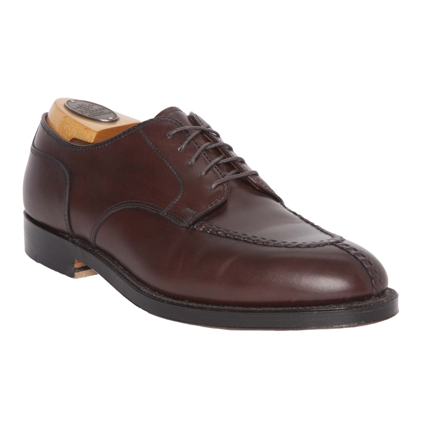 Alden Madison’s 968 - Norwegian Split Toe Blucher in brown calfskin features hand stitching, a black sole, and comes with a wooden shoe tree, shown on a white background.