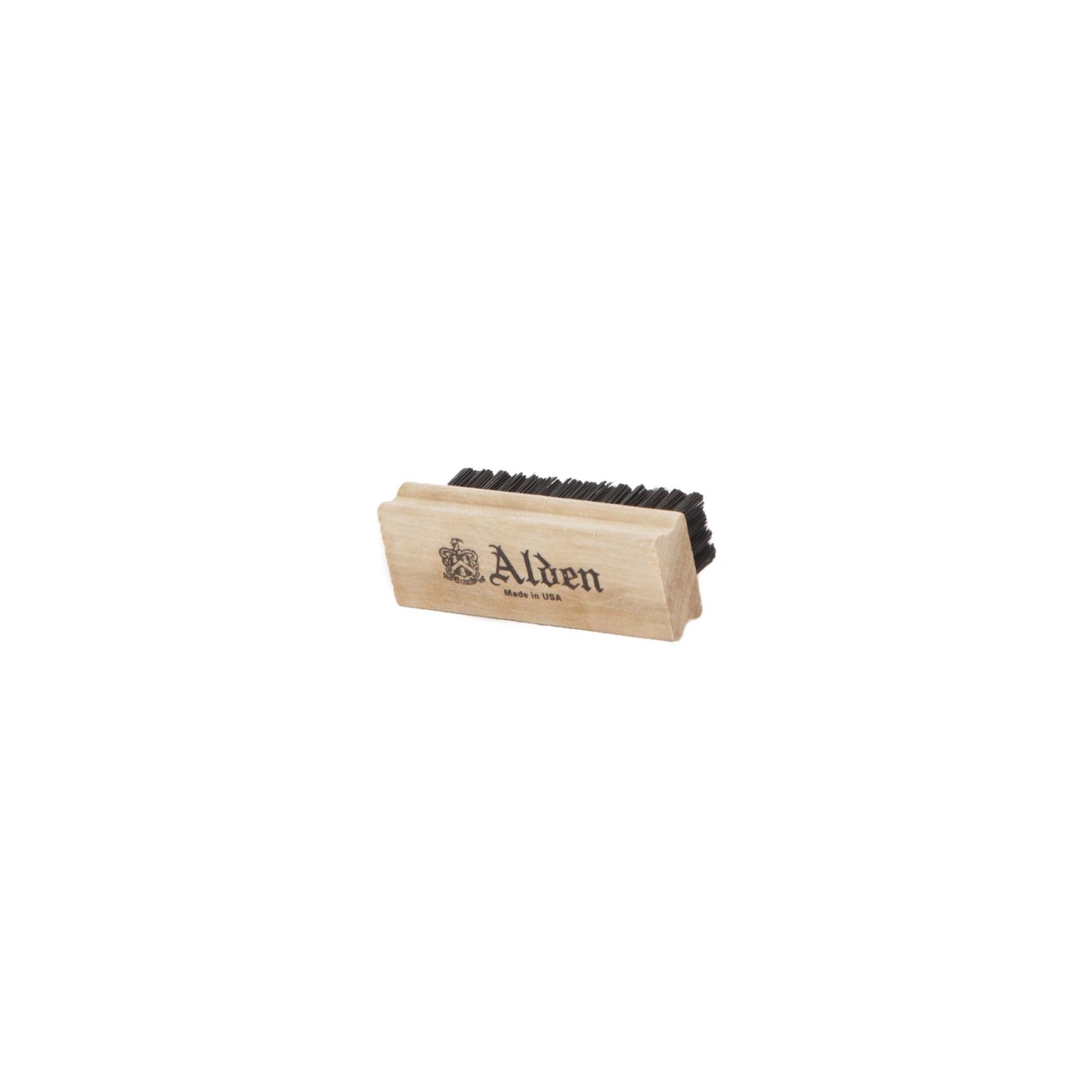 A wooden suede brush with soft, dark bristles features the embossed Alden Madison Since 1884 logo on the handle. It is angled to show top and side views and proudly made in the USA.