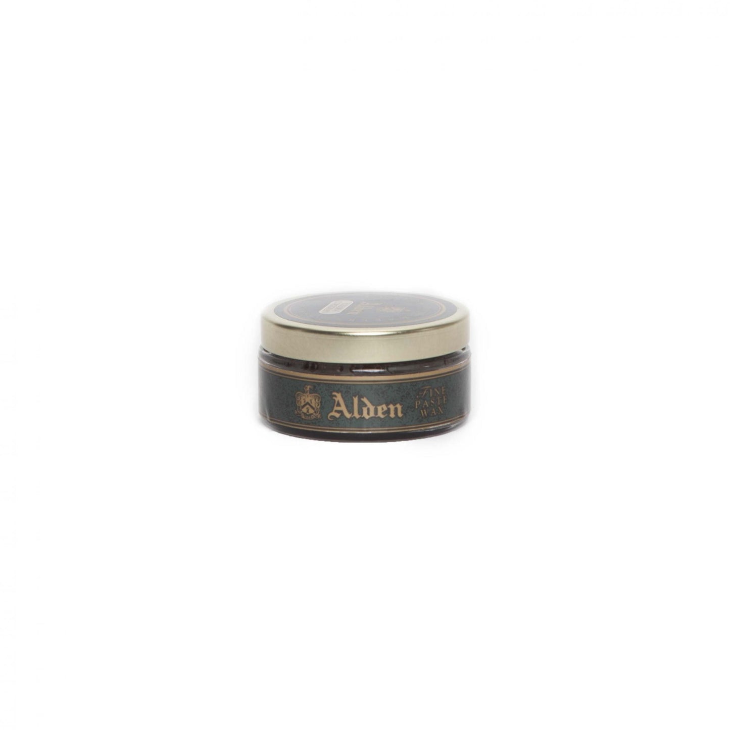 A small, round tin with a beige lid and dark body sits centered on a white background. Its labeled Alden Paste Wax, showcasing the prestigious Alden Madison logo and text on the side.