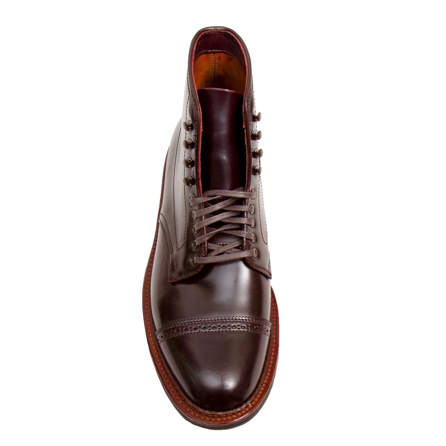 The Alden Madison D6861HC Jumper Boot in Color 8 Shell Cordovan features a top view of a single dark brown leather boot crafted on the Barrie Last with laces, decorative toe cap stitching, a glossy finish, and brown outsole.