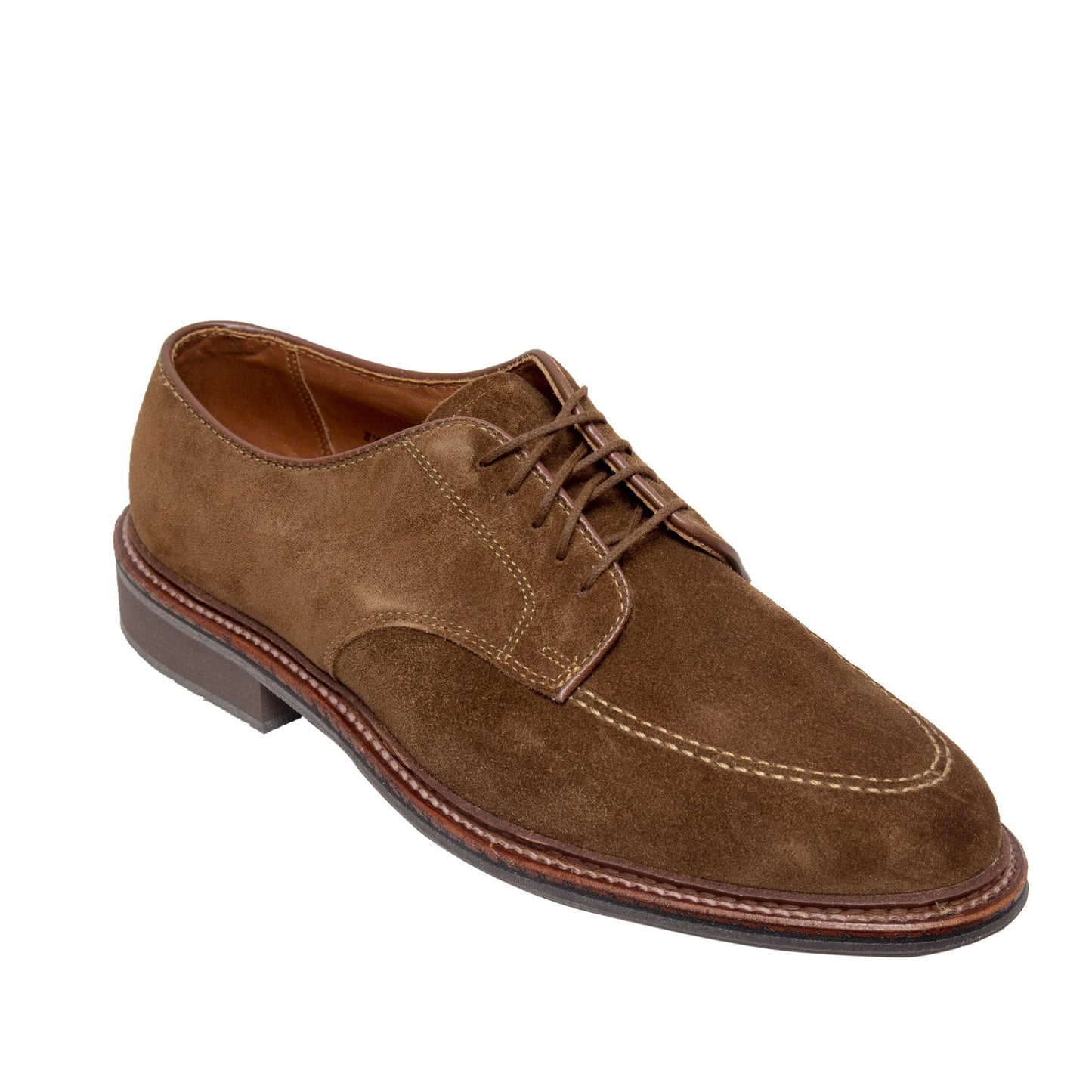 The 702 - Mocc Toe Blucher in Snuff Suede by Alden Madison features visible stitching, brown laces, and a dark dress rubber sole, shown angled against a white background.