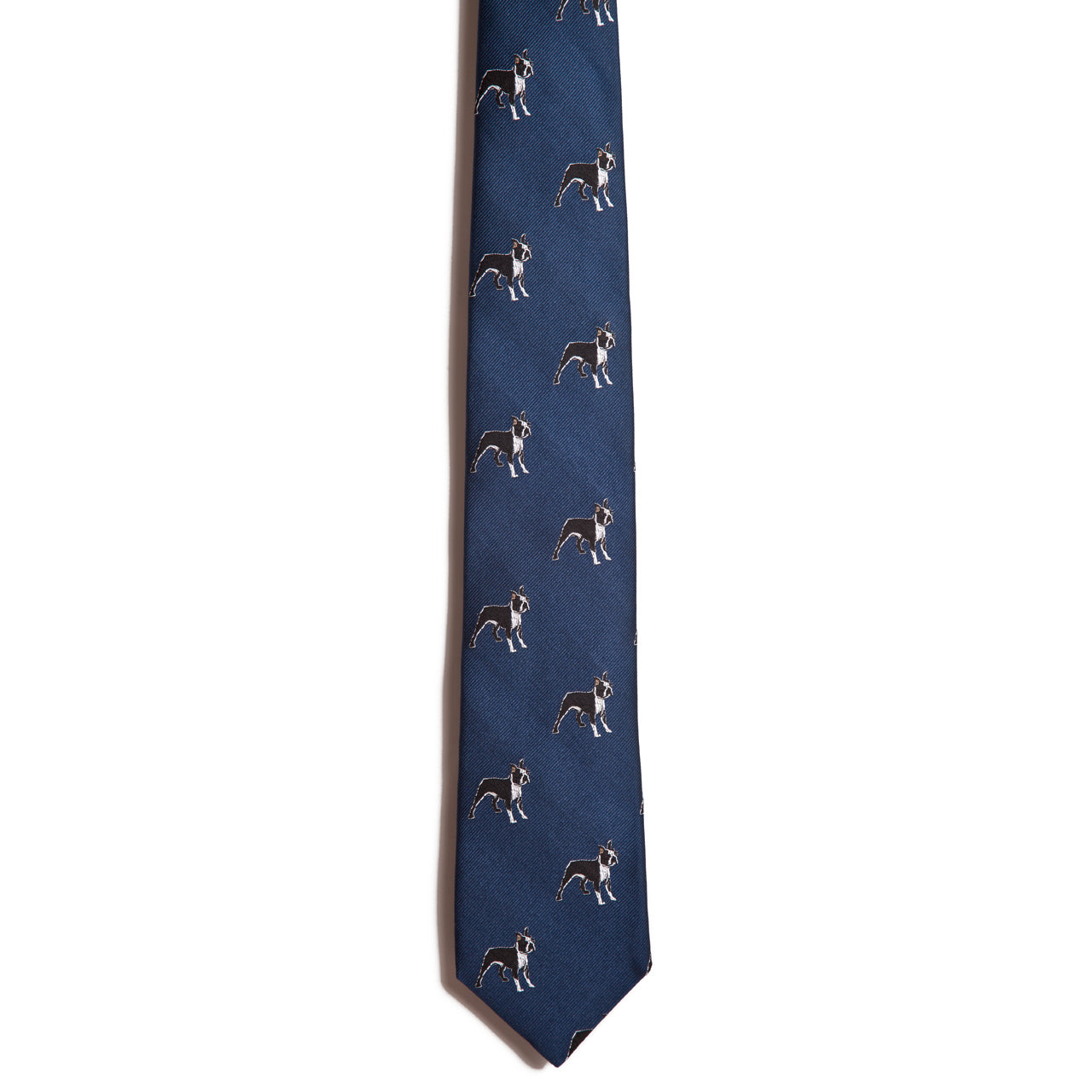 The Alden Madison Boston Terrier is a navy blue silk jacquard tie featuring small, embroidered Boston Terriers on a white background—ideal for dog lovers.