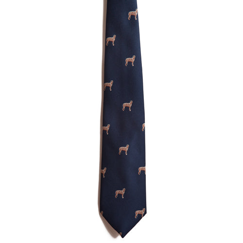 The Alden Madison Irish Wolfhound tie is a navy blue jacquard silk accessory featuring a repeating pattern of small embroidered brown Irish Wolfhounds—an ideal addition to any dog breed necktie collection.