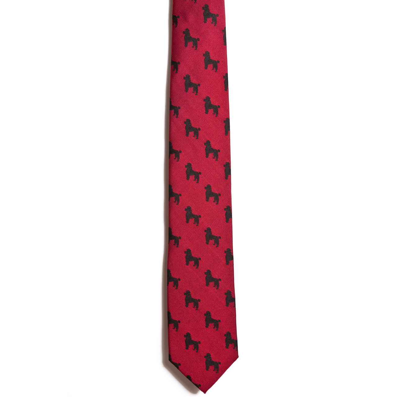 The Alden Madison Black Poodle tie is a red silk jacquard necktie featuring small black dog silhouettes, adding playful charm to any outfit. Displayed against a white background.