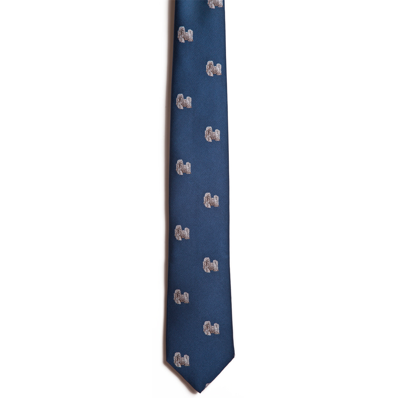 The Alden Madison Shih Tzu necktie is navy blue silk jacquard, featuring a repeating pattern of small, light-colored Shih Tzu illustrations on the fabric against a plain white background.