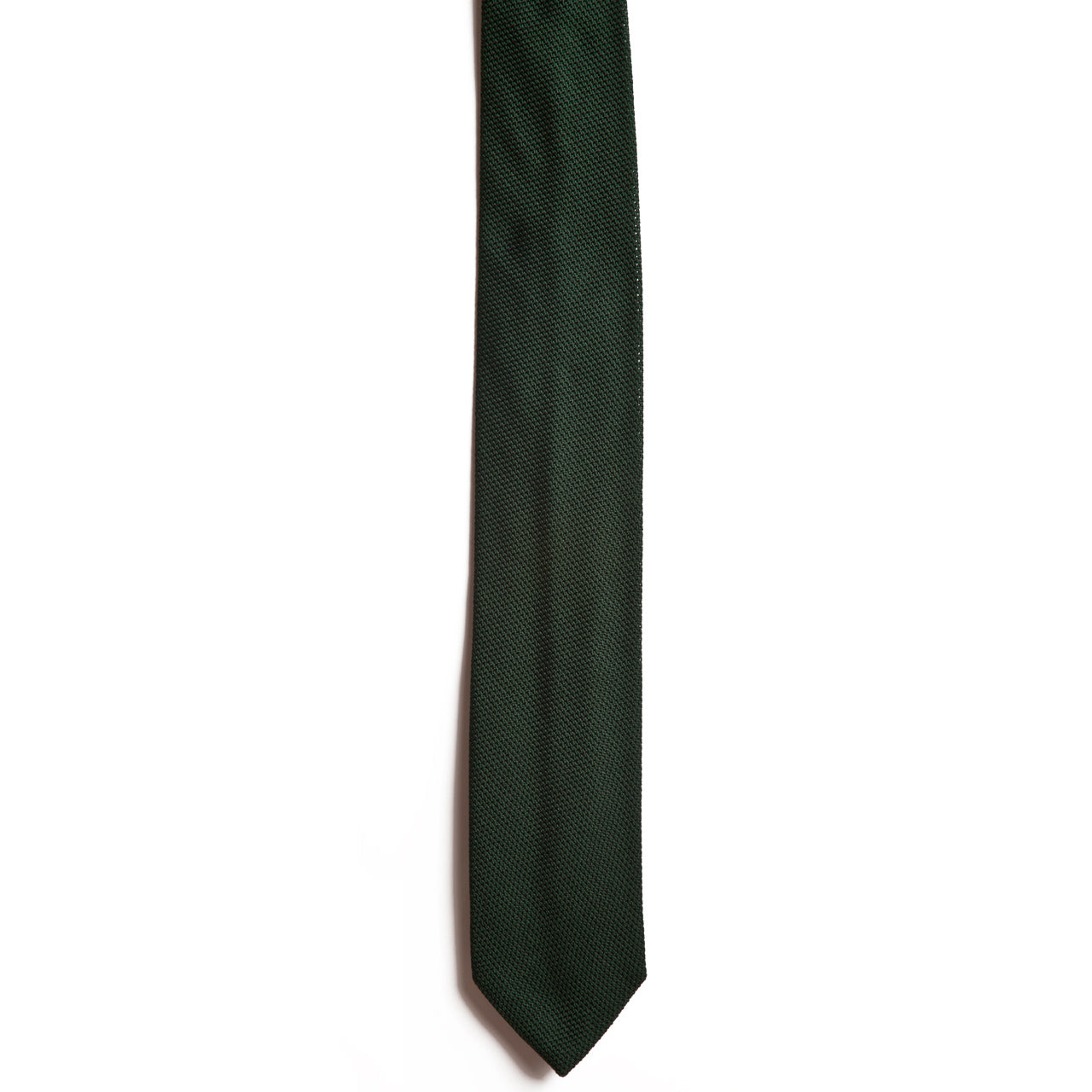 The Forest Green tie from Alden Madison is crafted from luxurious Italian silk. It features a textured pattern with a white background, neatly vertically oriented to showcase its full length.
