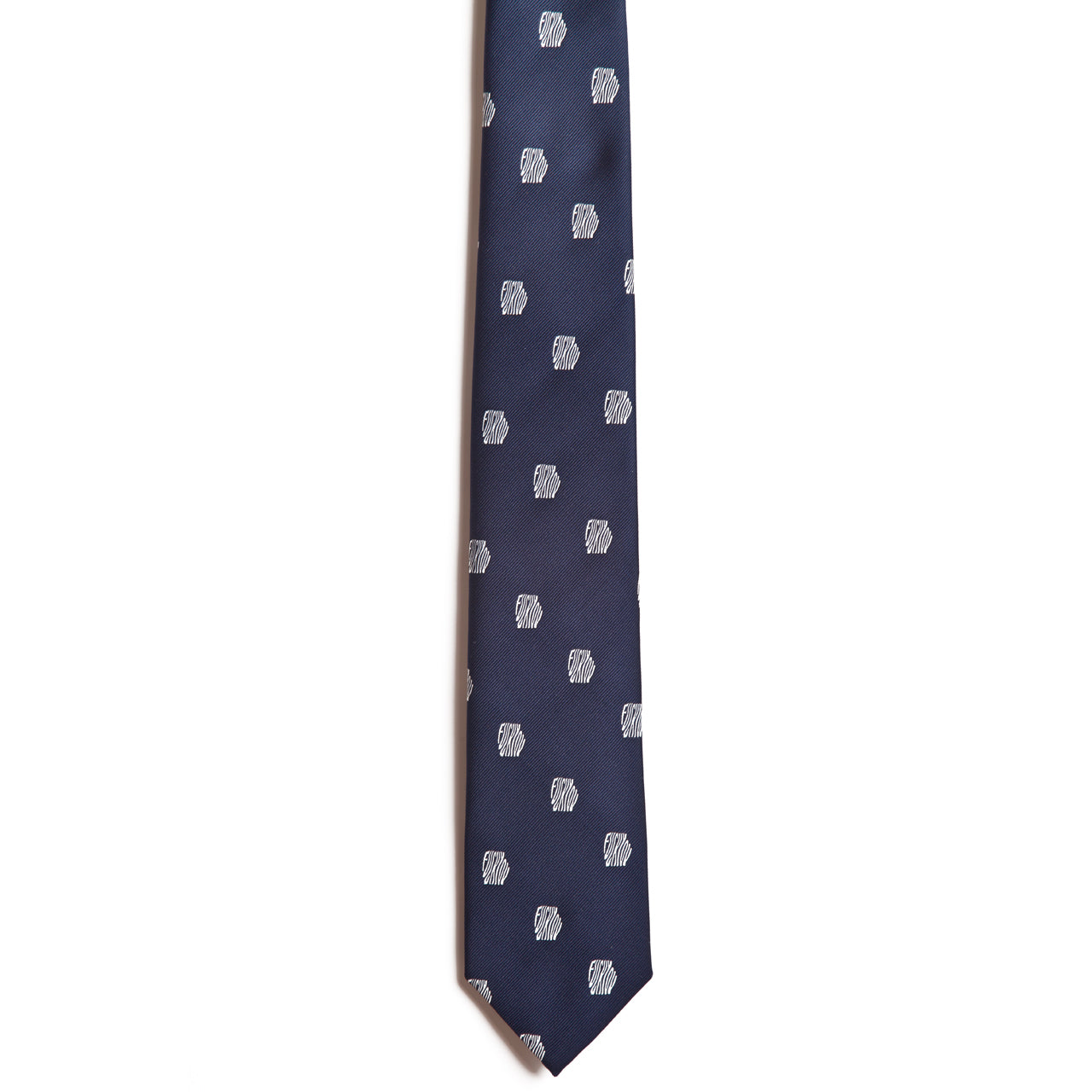 The Look Closely Tie (White) by Alden Madison is a 100% silk blue tie featuring a pattern of small white geometric shapes.