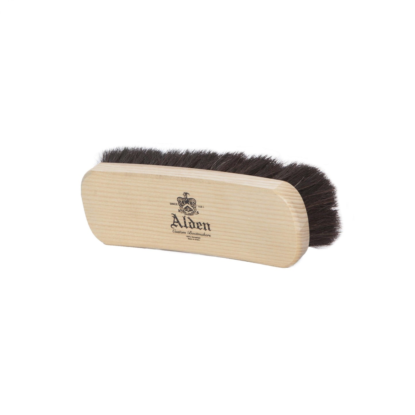 The Horse Hair Brush (Large) by Alden Madison is a handcrafted wooden shoe brush with dark horse hair bristles, featuring the brand logo and Alden printed on the handle. Made in the USA for superior quality.