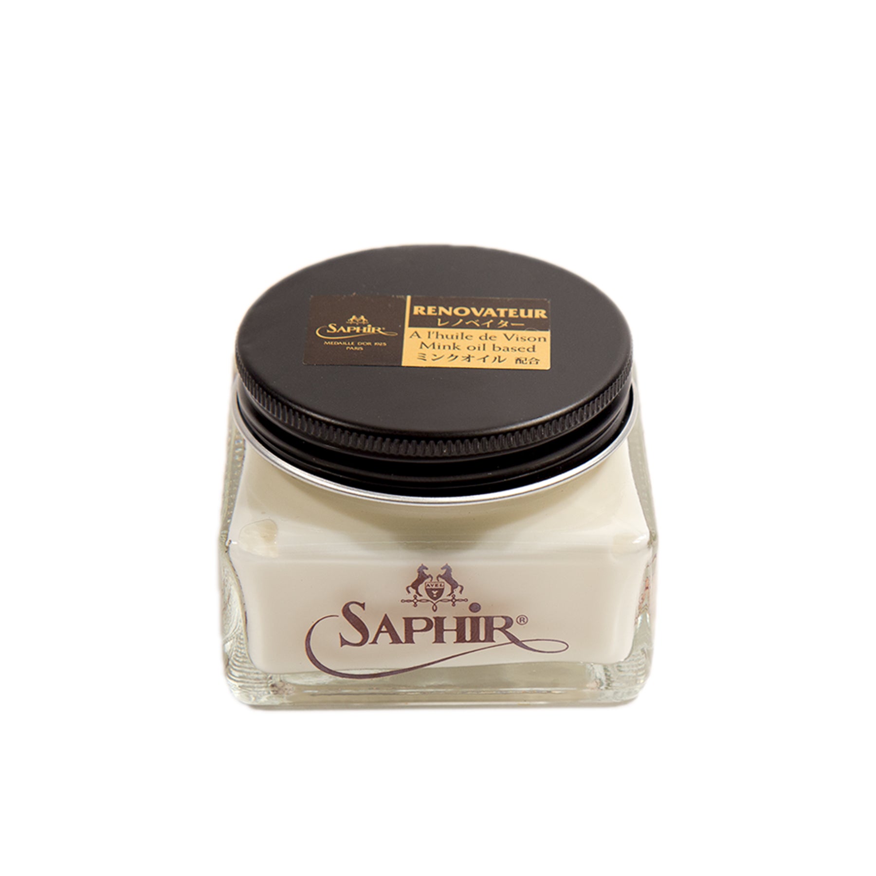 Square glass jar of Alden Madisons Saphir Renovateur leather conditioner with a black lid; contains neutral cream enriched with mink oil. The Saphir logo is on the front, and a multilingual gold label adorns the lid.