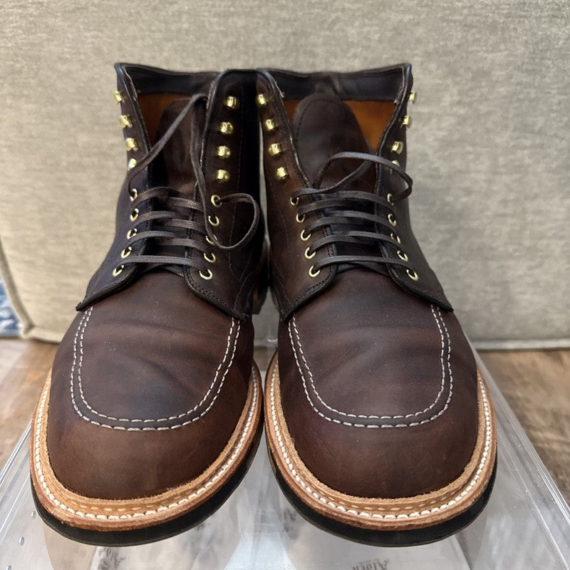 A pair of ALDEN SHOES D5920HC - Kudu Indy w Commando Sole boots in dark brown Kudu leather with white stitching and brass eyelets, shown side by side on a clear surface against a neutral background.