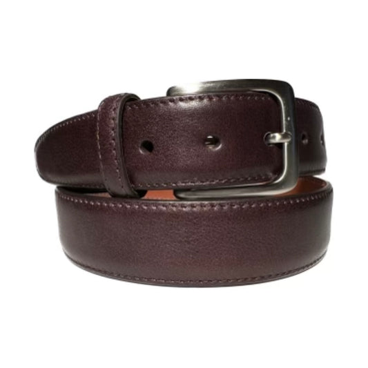 The MB 5334 Arabica Lux Belt by Alden Madison features a 35mm wide brown leather design with a nickel buckle. Rolled in a circle, it highlights its texture and detail, while the buckles metallic sheen contrasts with the leathers rich tone, complete with multiple holes for size adjustments.