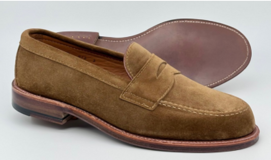 Alden Madison 6173F - Penny Loafer in Snuff Suede: one shoe stands upright, the other lies on its side to show the flex leather sole.